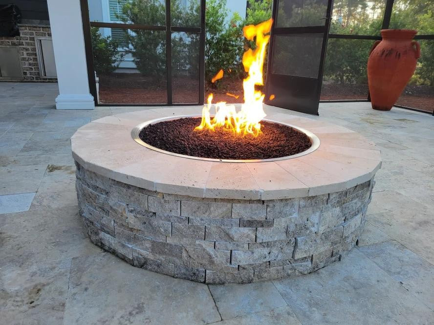 TessaRai Round Fire Pit Kit at dusk